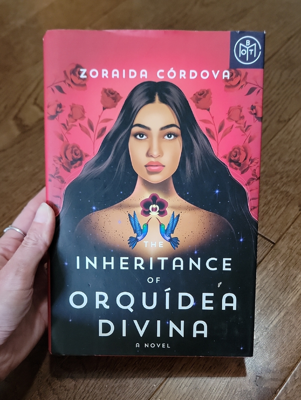 The Inheritance of Orquídea Divina by Zoraida Córdova - Red & Black Paperback